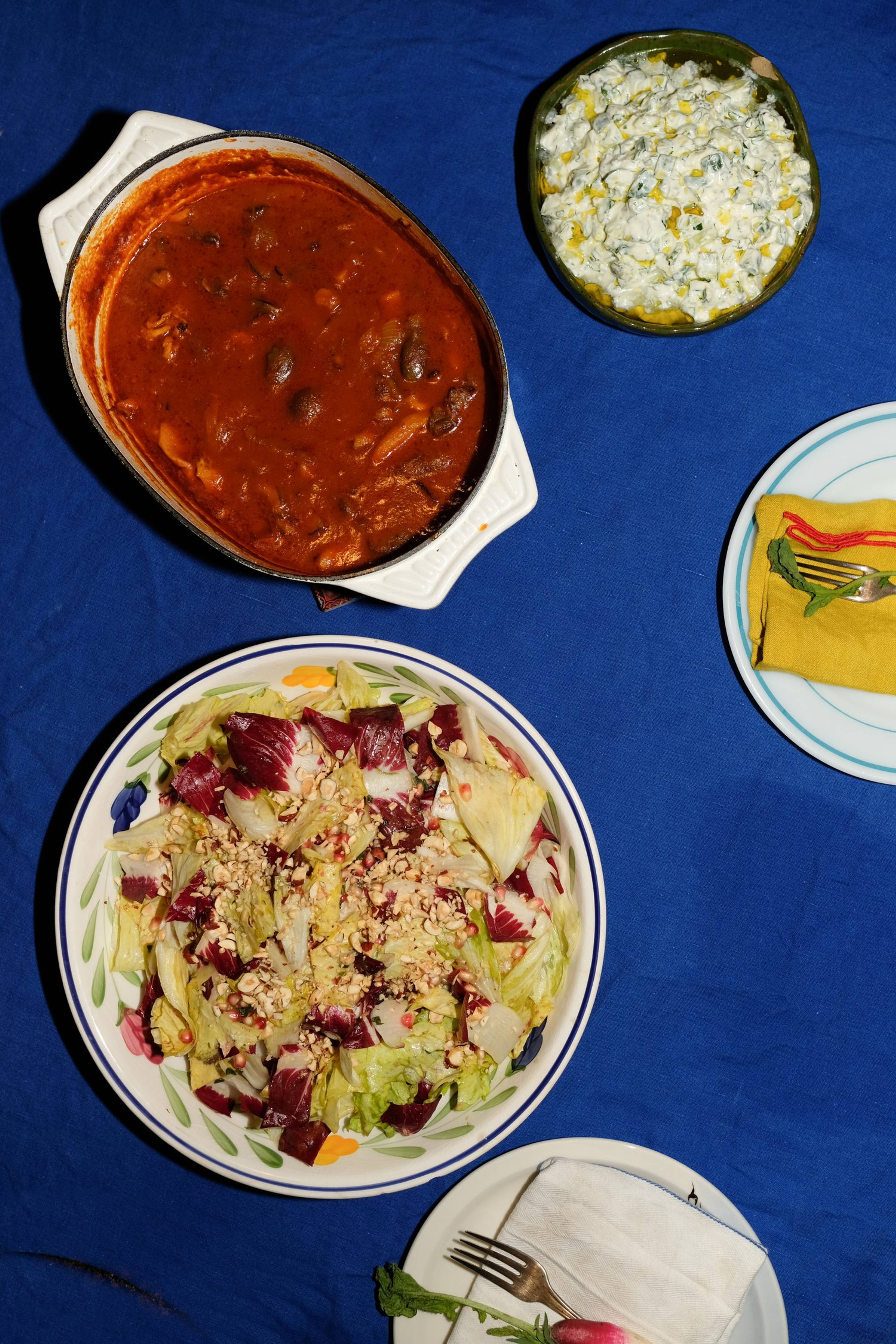 radicchio salad served on a plate on blue tablecloth