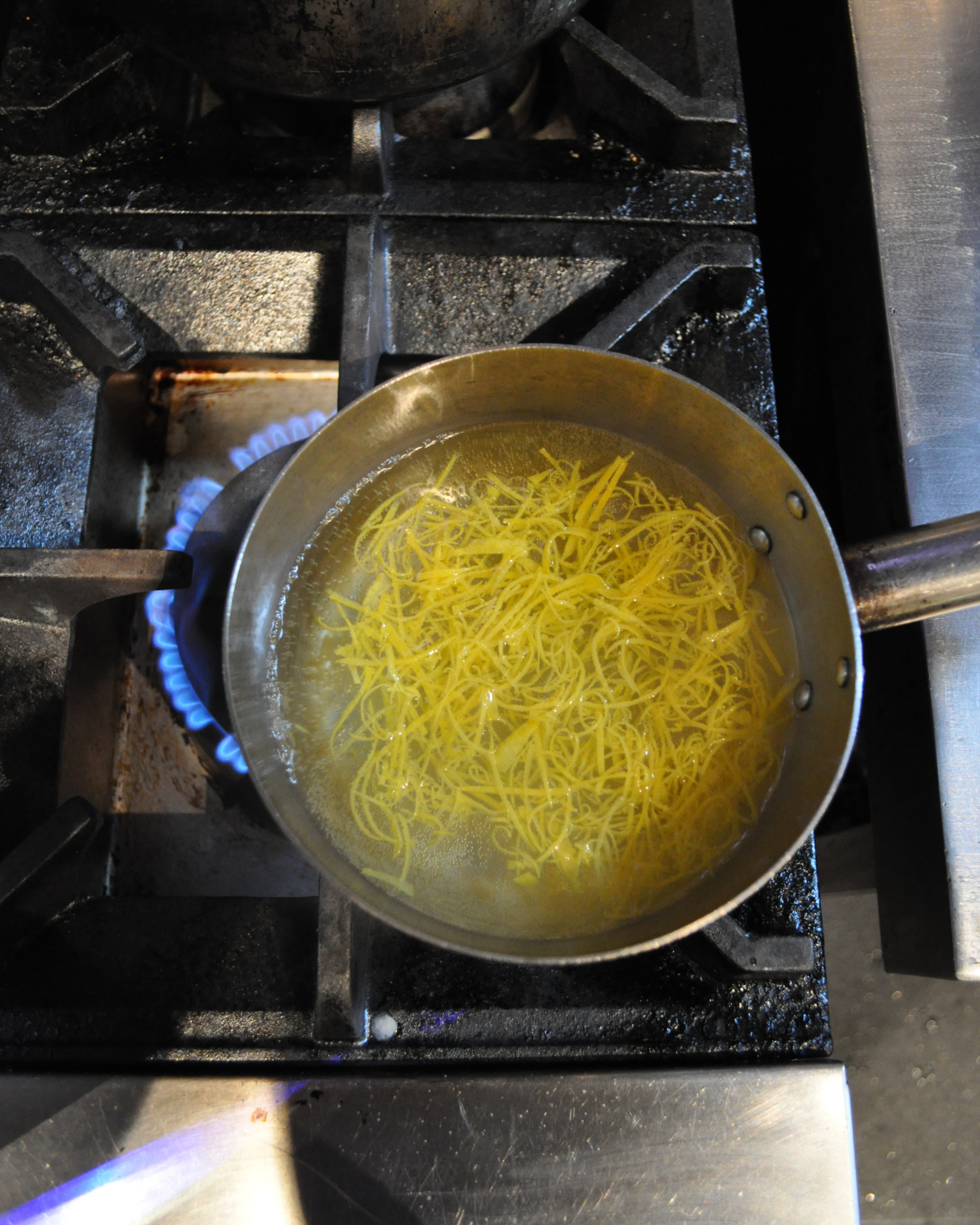 making the confit fruit peel