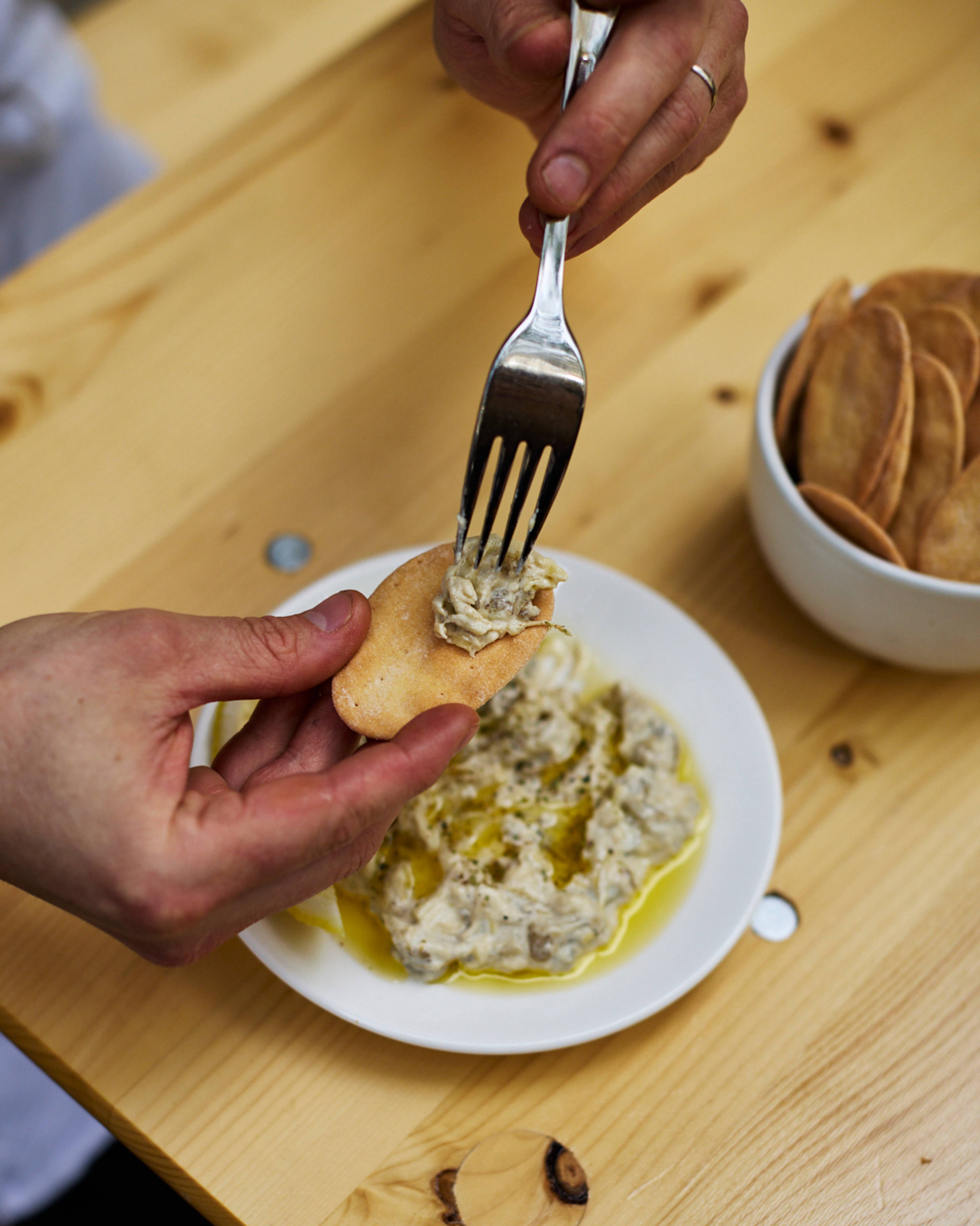 serving mouttabal on crackers