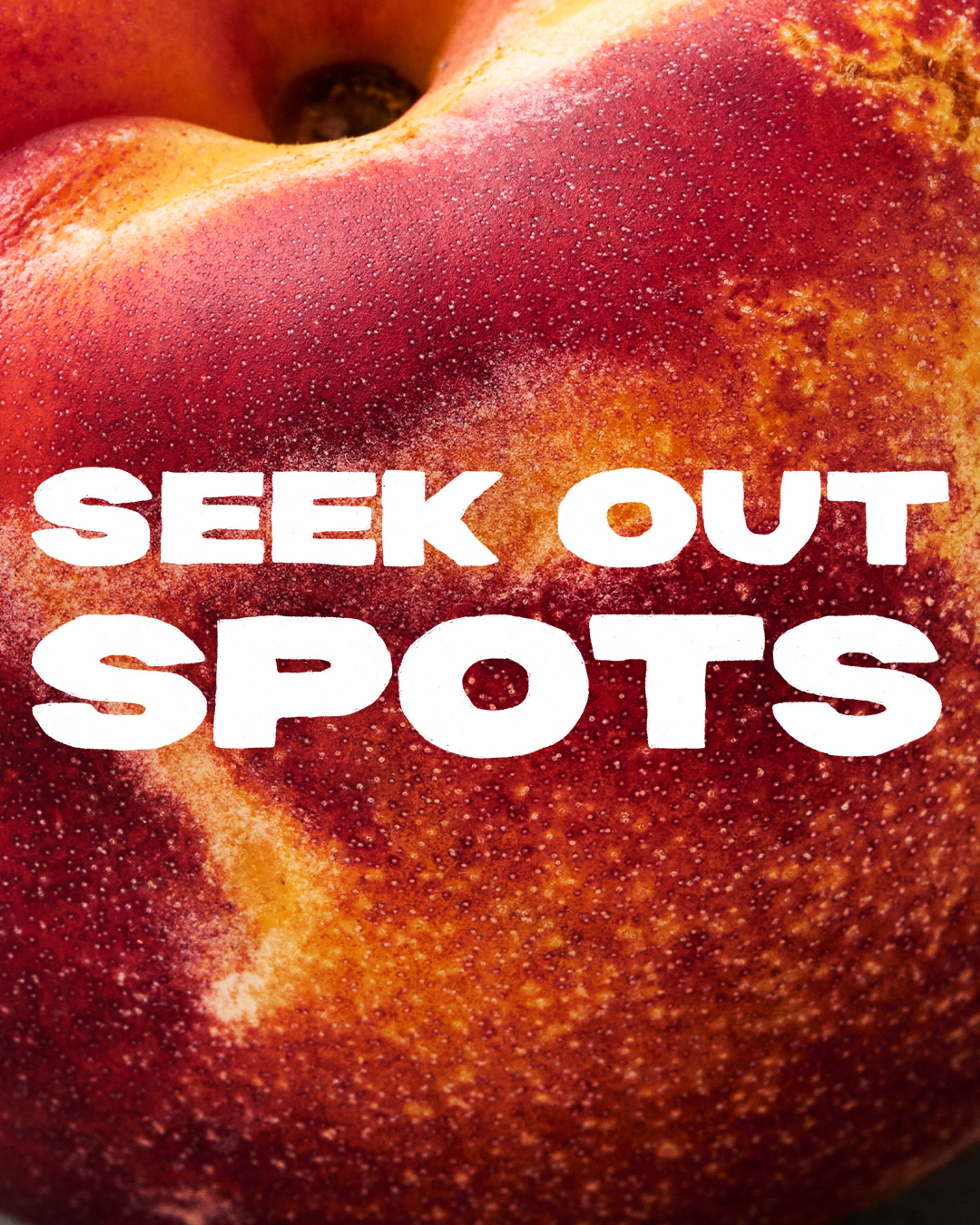 speckled nectarine with copy overlay 'seek out spots'
