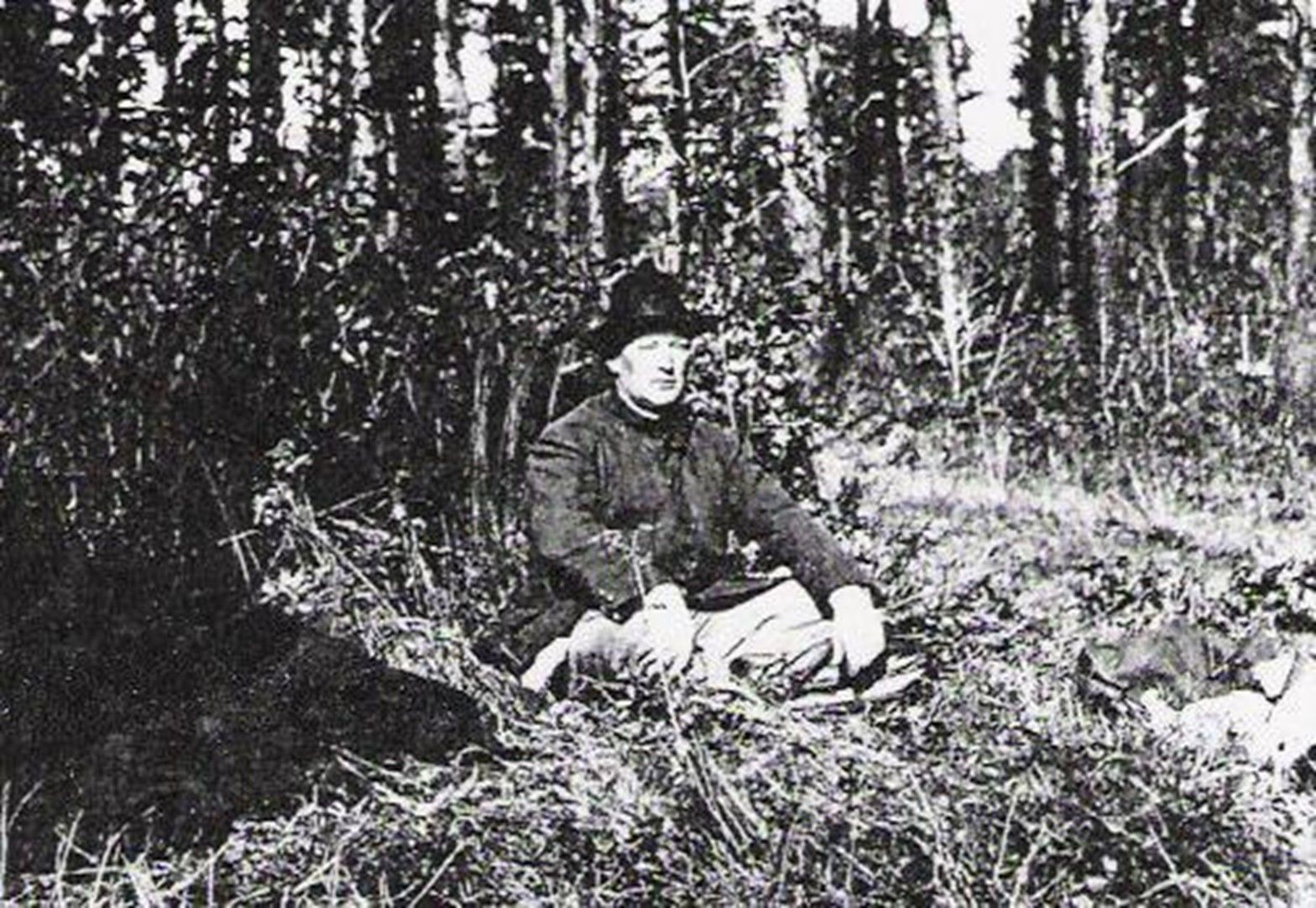 Crump the hunter resting in the wilderness.