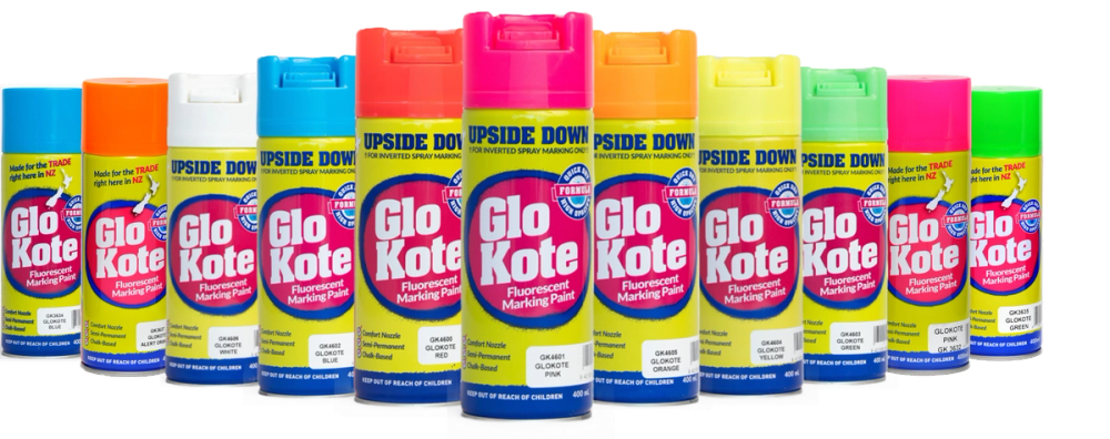 several cans of glo kote are lined up in a row several cans of glo kote are lined up in a row
