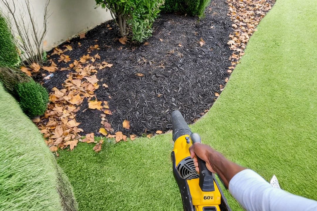 PetraMax LockScape Mulch Glue Max kit, pump sprayer, and a freshly treated mulch bed