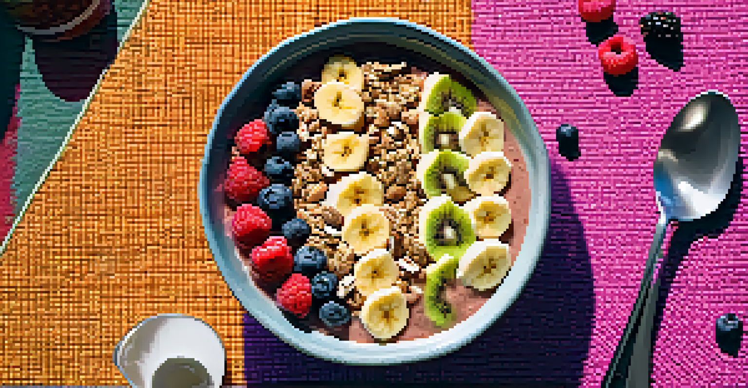 A colorful smoothie bowl with nut milk creamer topped with fruits and granola on a woven mat, with a glass of nut milk creamer in the background.