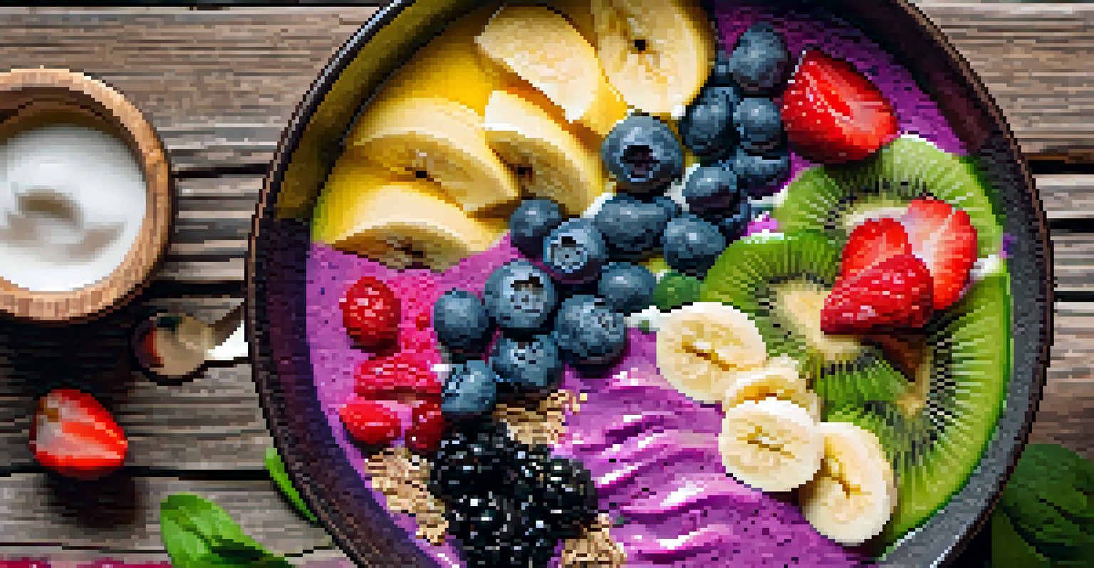 An overhead view of a smoothie bowl made with spinach and banana, topped with chia seeds, almonds, and berries, placed on a rustic wooden surface.