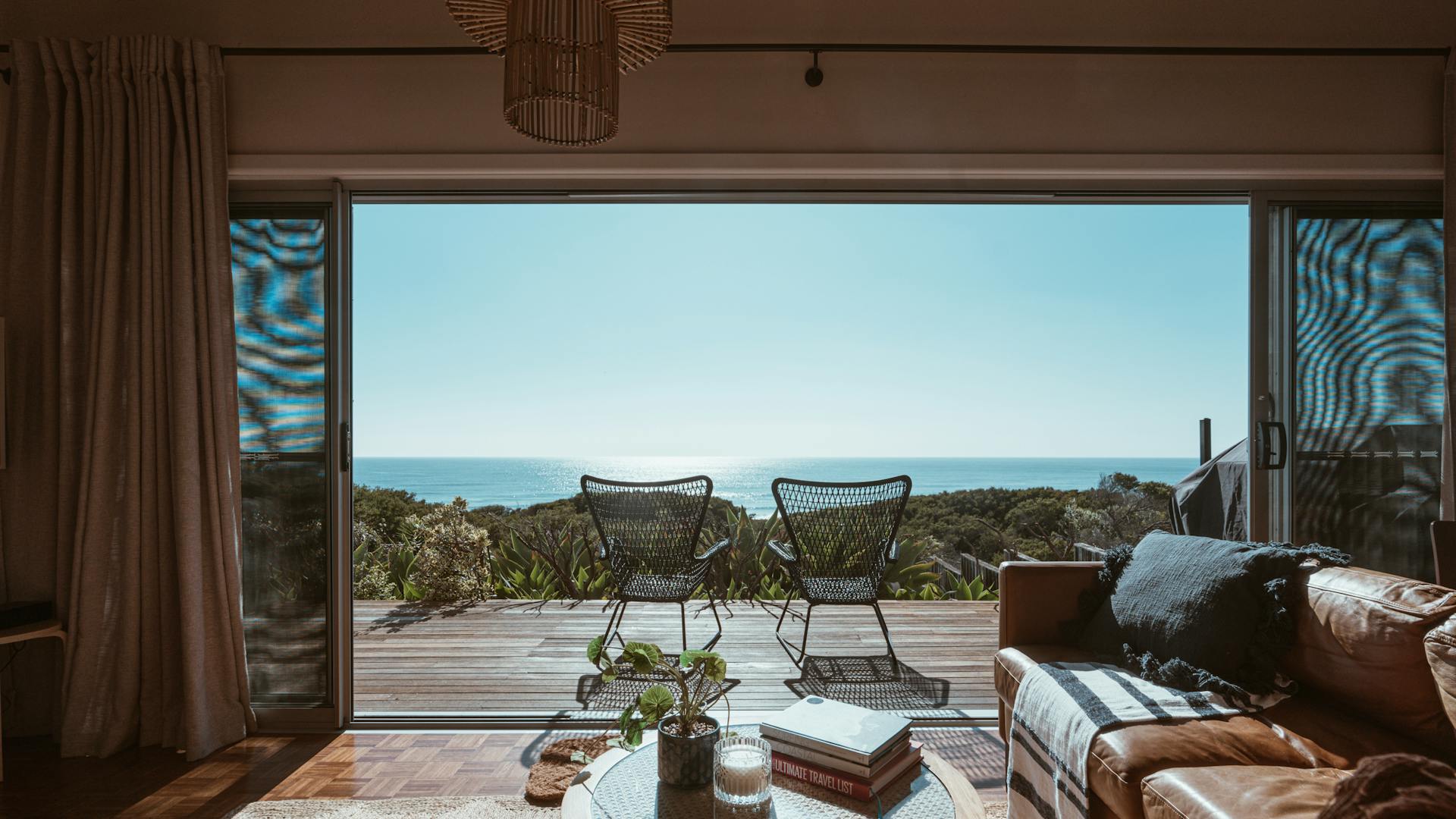 Terrace of modern villa overlooking ocean