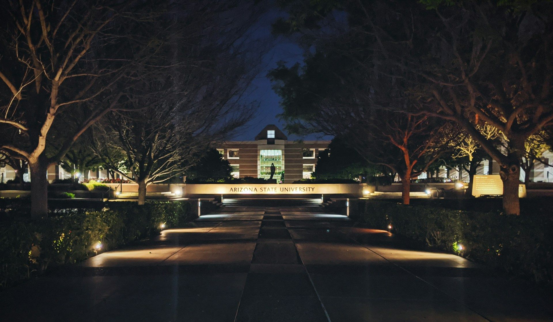  Arizona State University West Campus landmark signage in front of Fletcher Library at dusk.