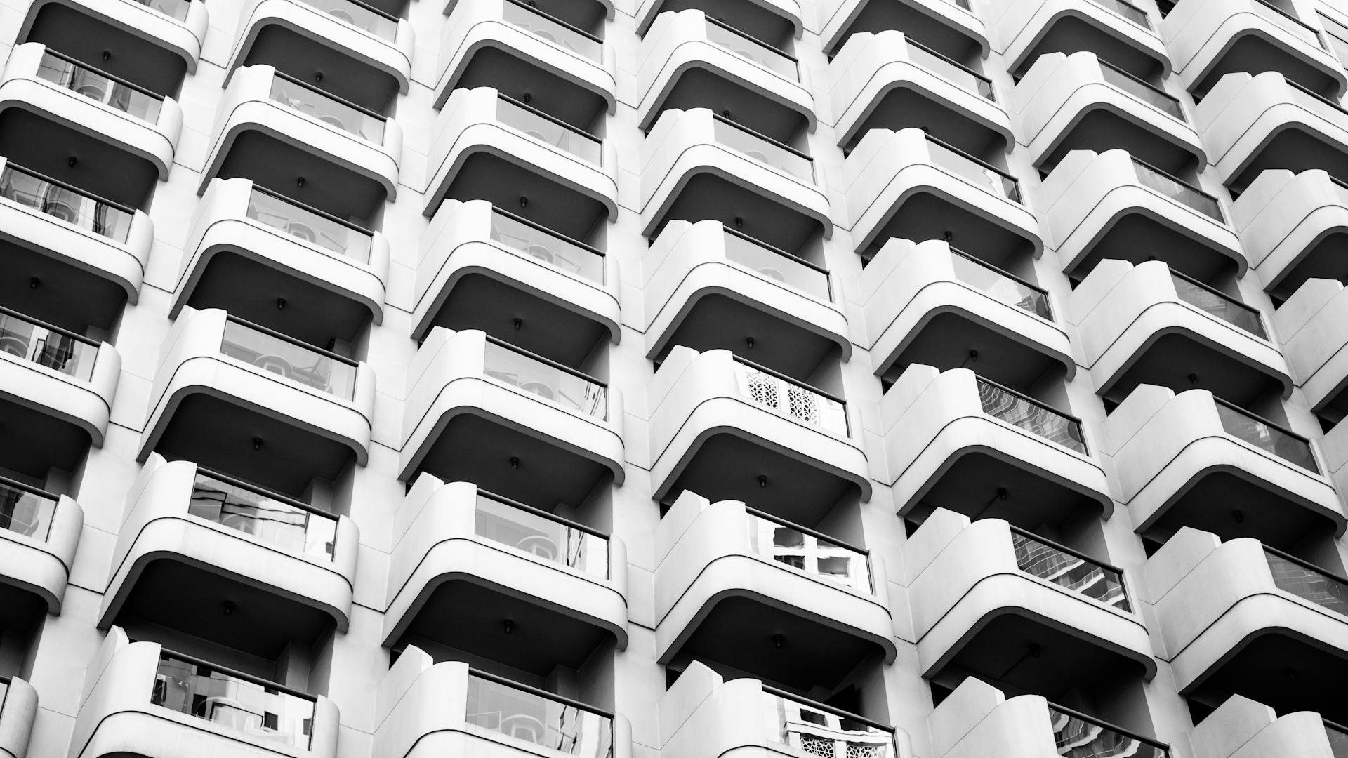 Low-angle Photography of Gray Concrete Condominium