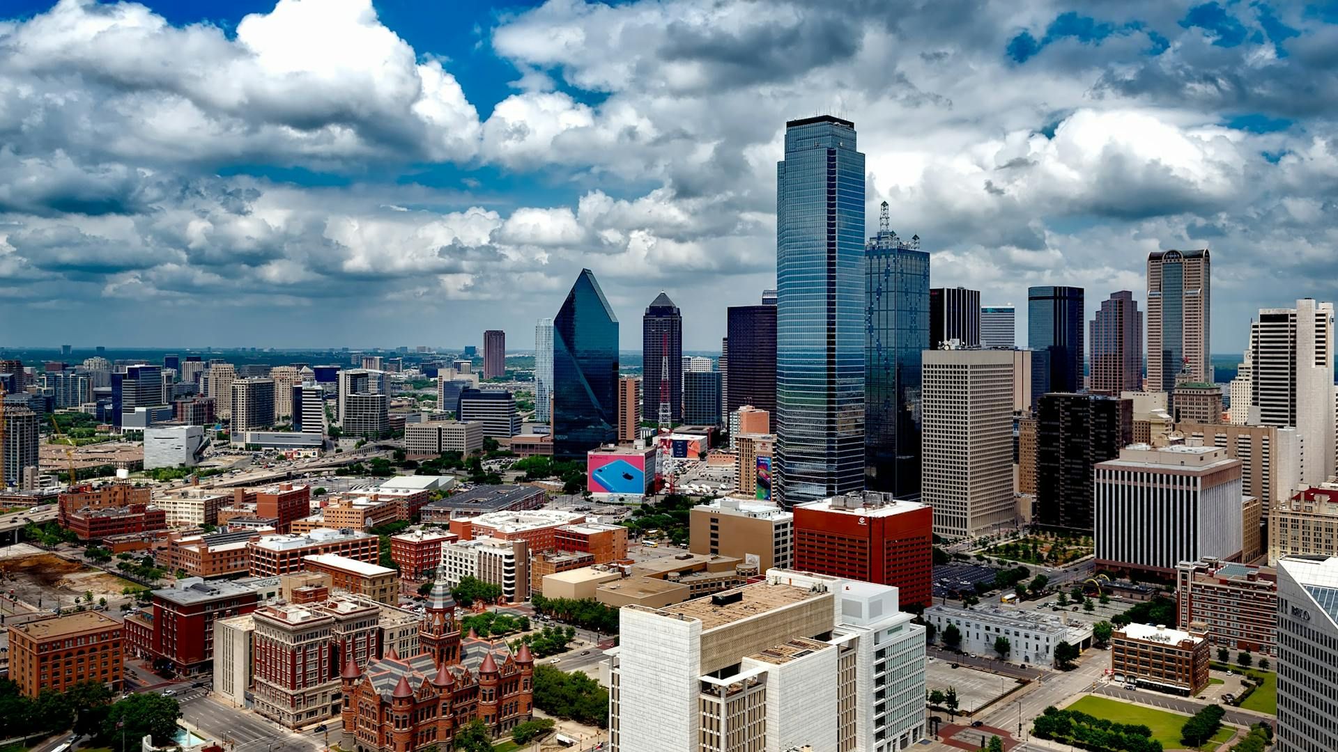 Aerial Photo of Dallas Under White Clouds