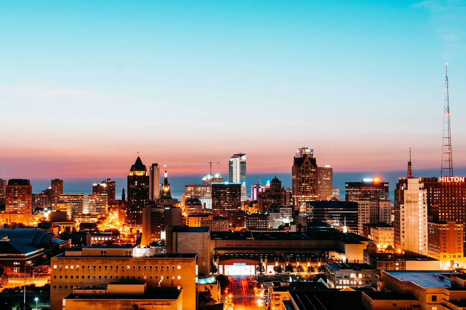 The sunrise shining on the Milwaukee skyline