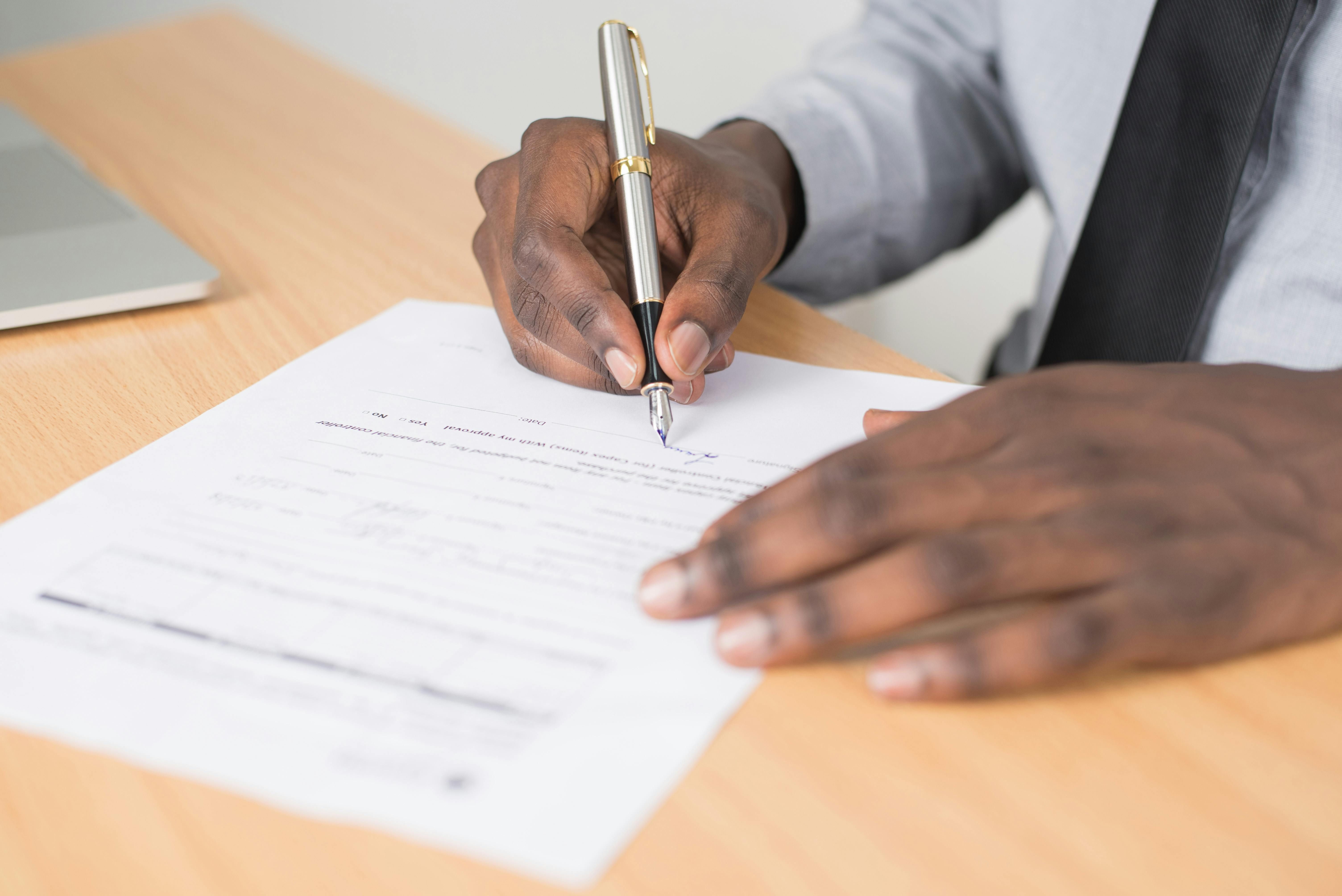 A person signing a contract