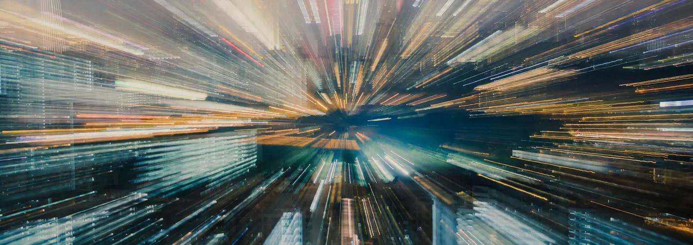 Blog_Abstract_colorful data moving fast towards center