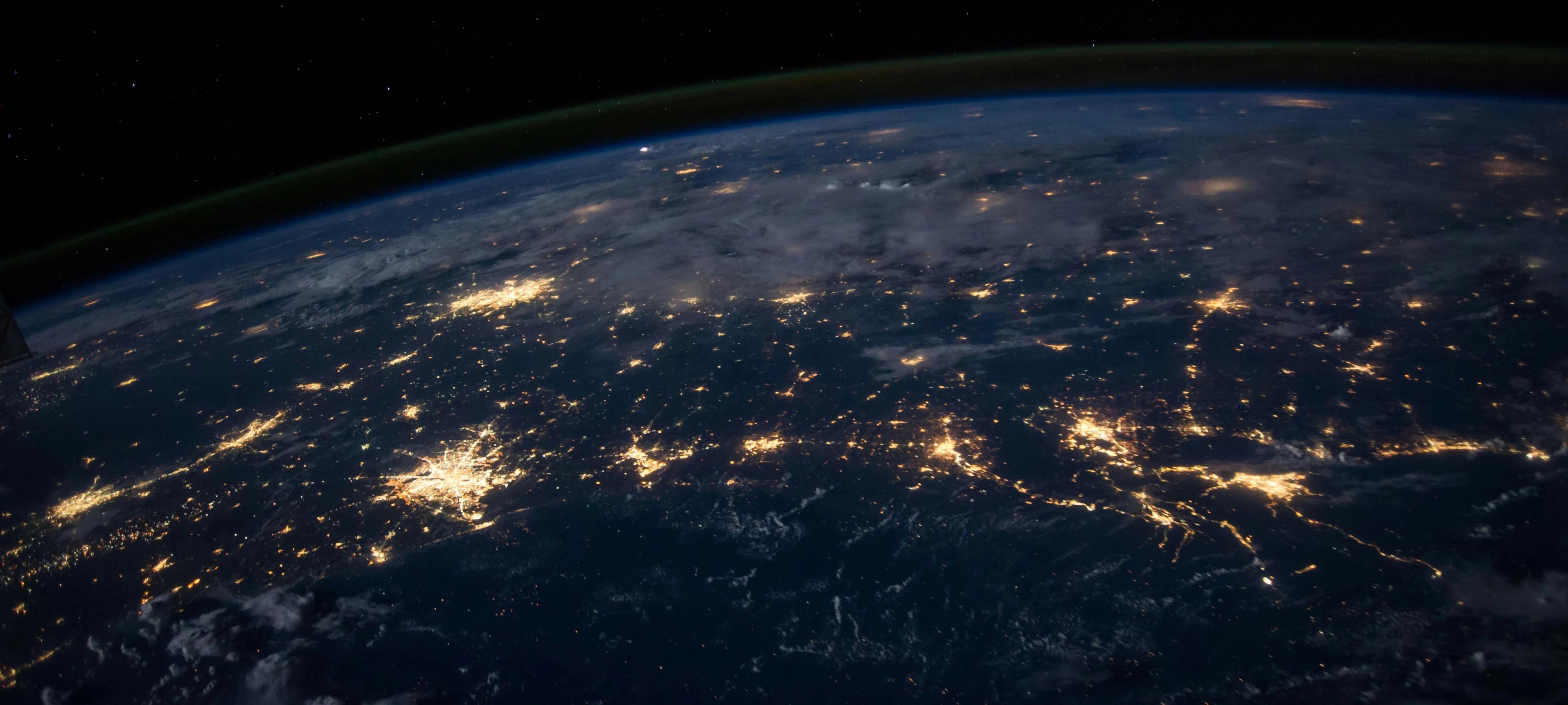 Blog_Inspirational_ Ariel View of Earth with City Lights (Web Optimized)