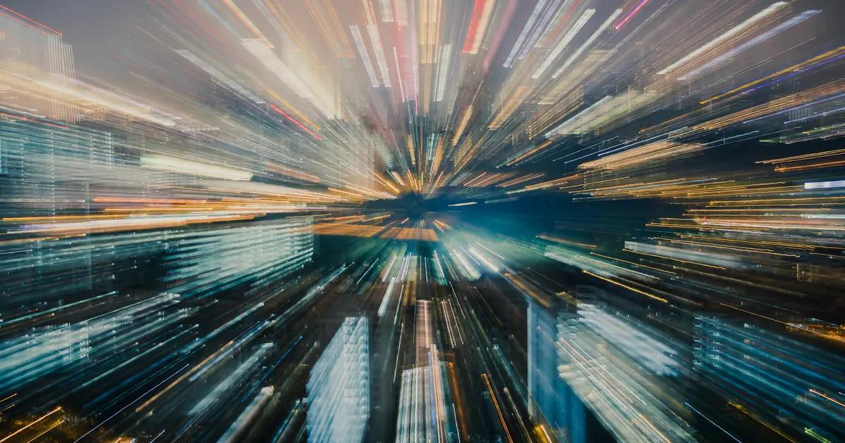 Blog_Abstract_colorful data moving fast towards center