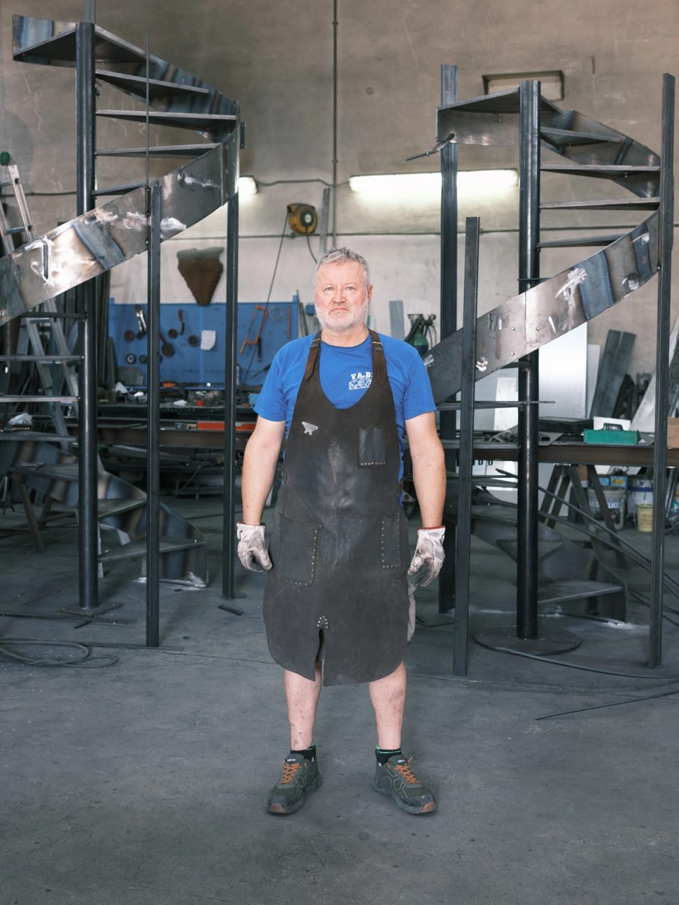 Metalworker standing in a workshop