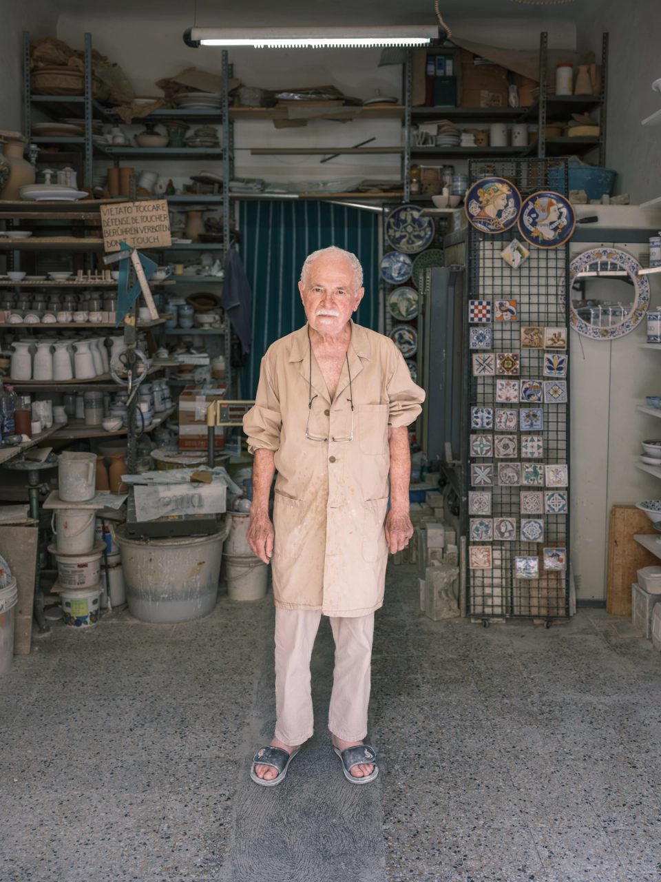 Ceramicist standing in a pottery workshop