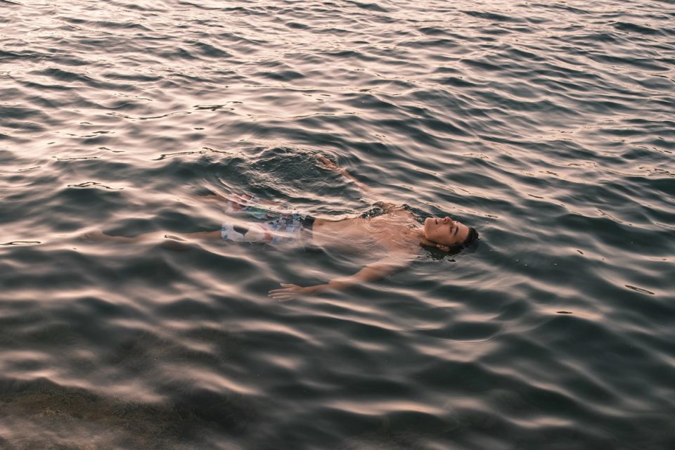 Man floating in the sea