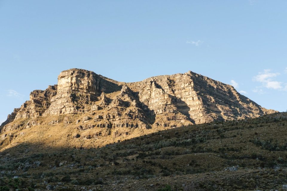 Mountain peak beneath a blue sky