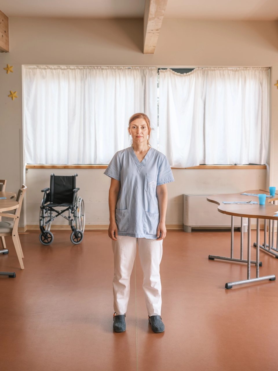 Nurse standing in a medical room