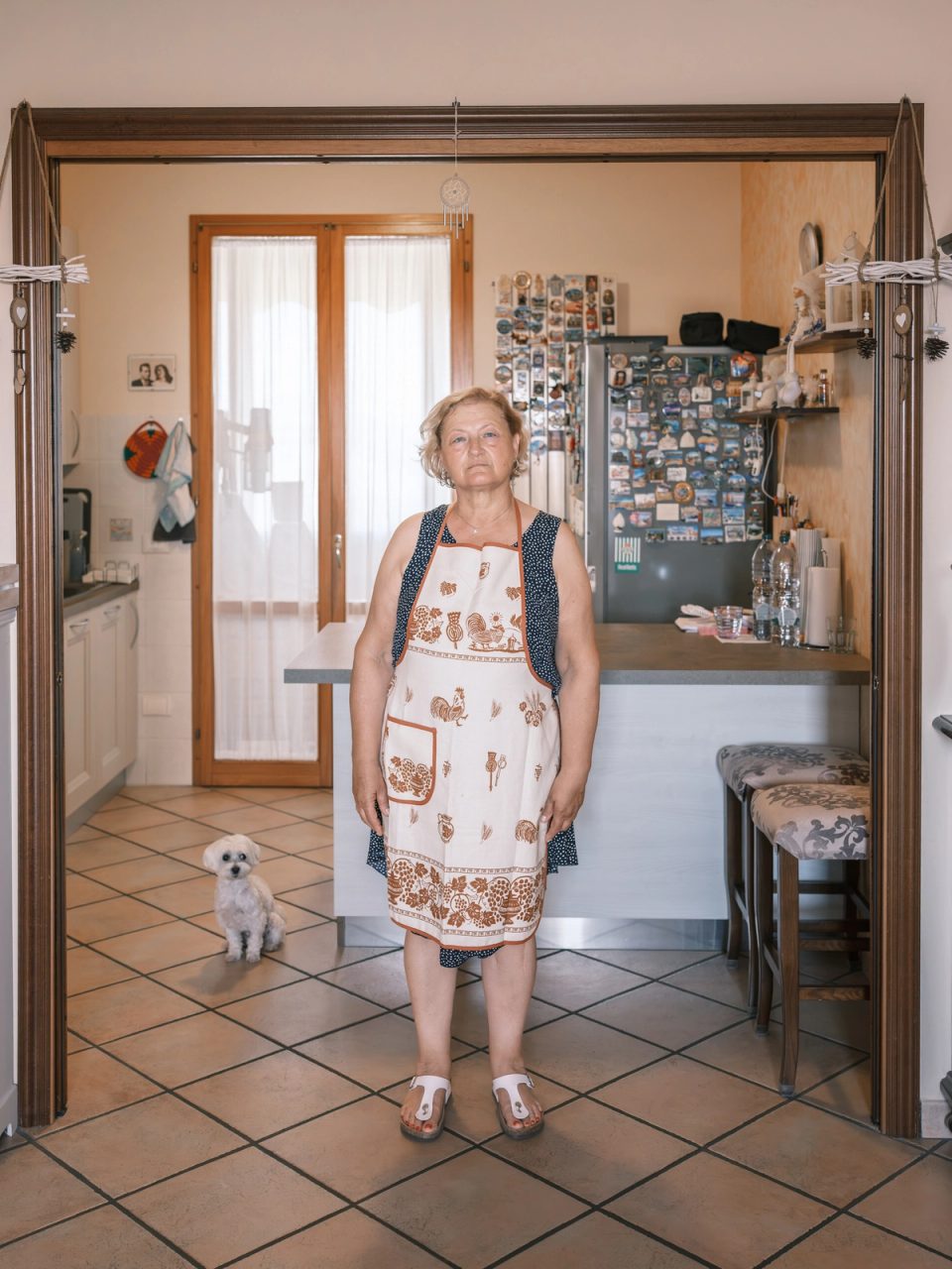 Woman wearing an apron in a kitchen
