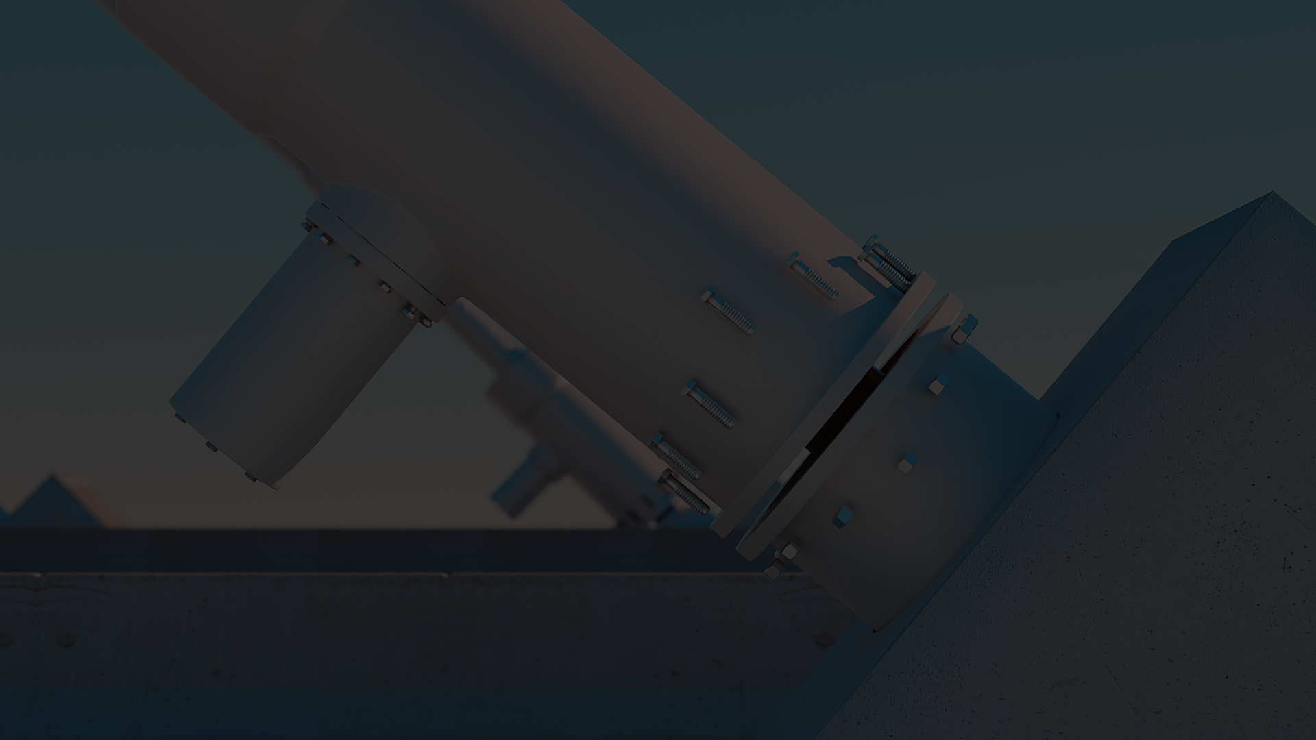 The image shows a close-up view of a large industrial pipe or cylindrical metal structure that is mounted to a concrete base. The pipe is secured with multiple evenly spaced bolts and nuts, connecting a flange to the concrete support. The background is out of focus and the lighting suggests either early morning or late afternoon, casting soft shadows on the metallic surface. The overall scene highlights the sturdy construction and precise assembly of the industrial equipment.