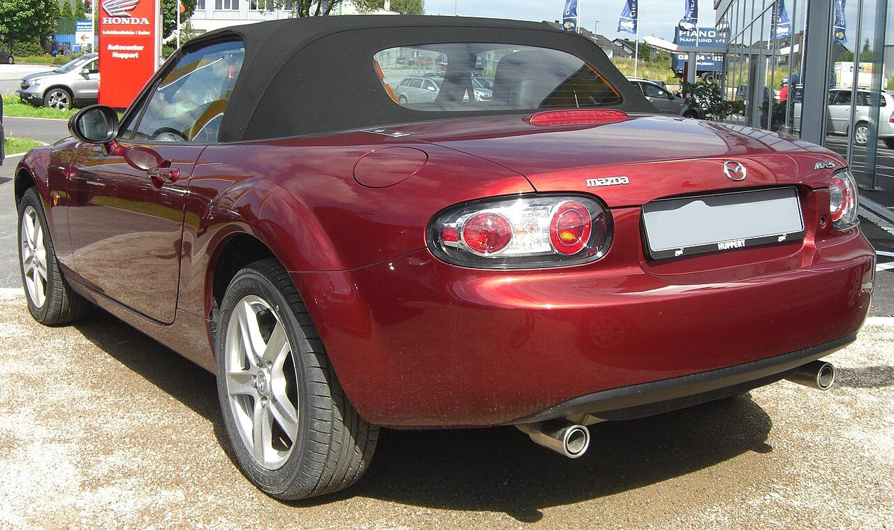 Rear view of a Mazda MX-5 NC with its roof raised