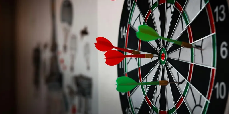 Close-Up Photo of Dart Pins on Dartboard
