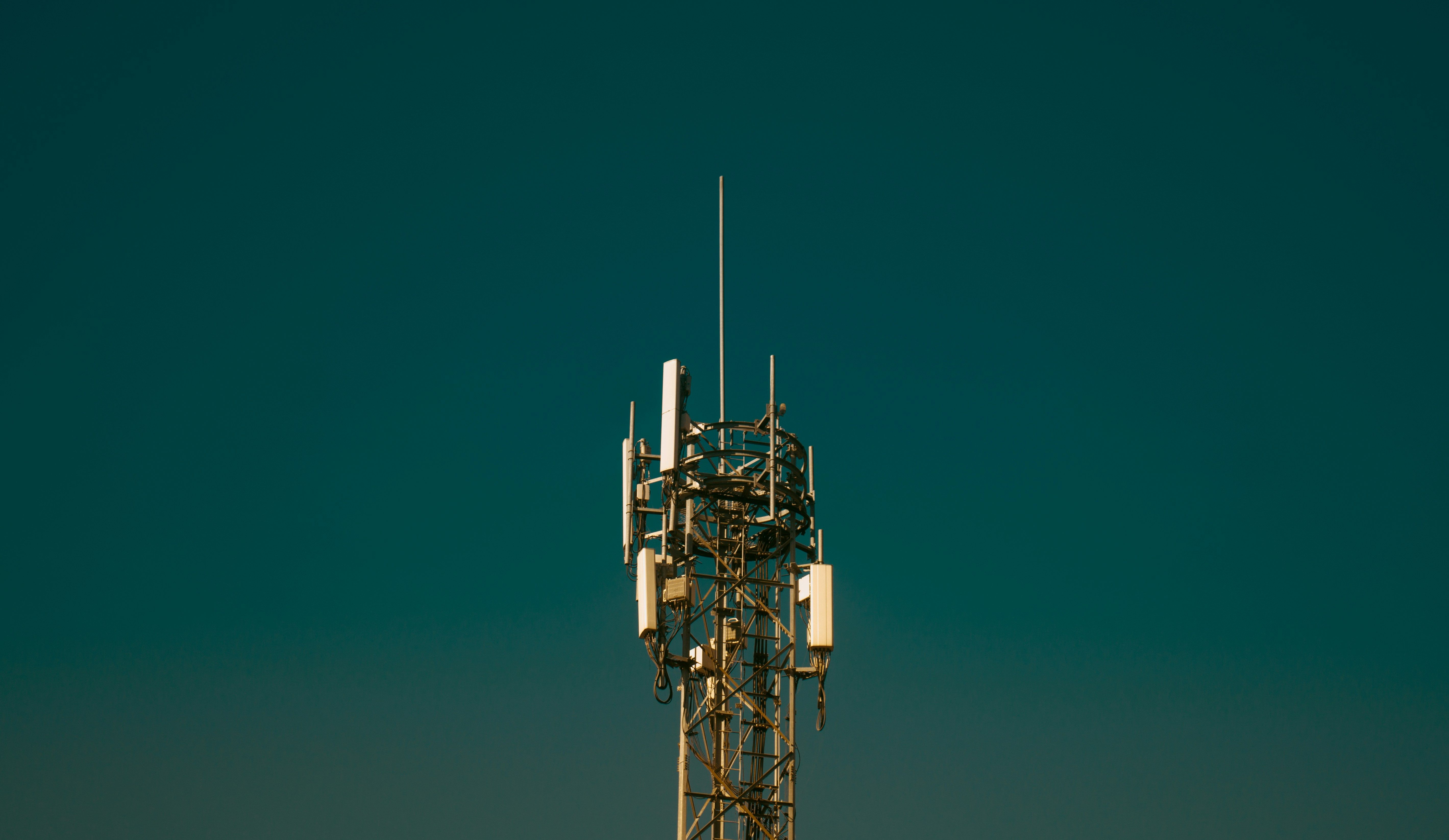 Radio antennae on a green sky