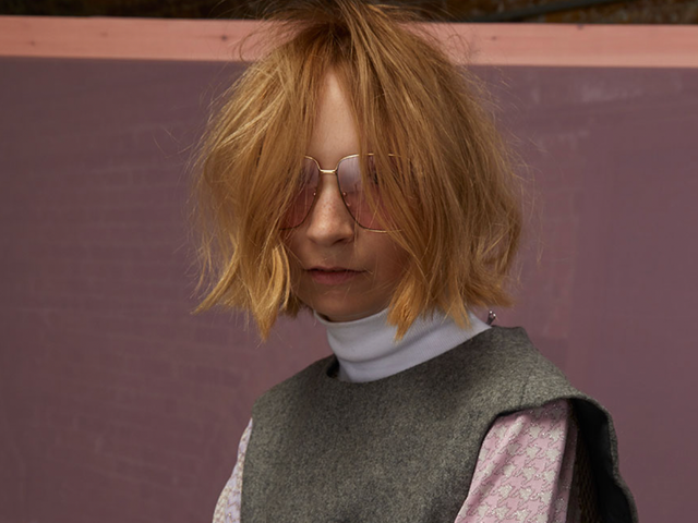 Model with a choppy, textured blonde bob