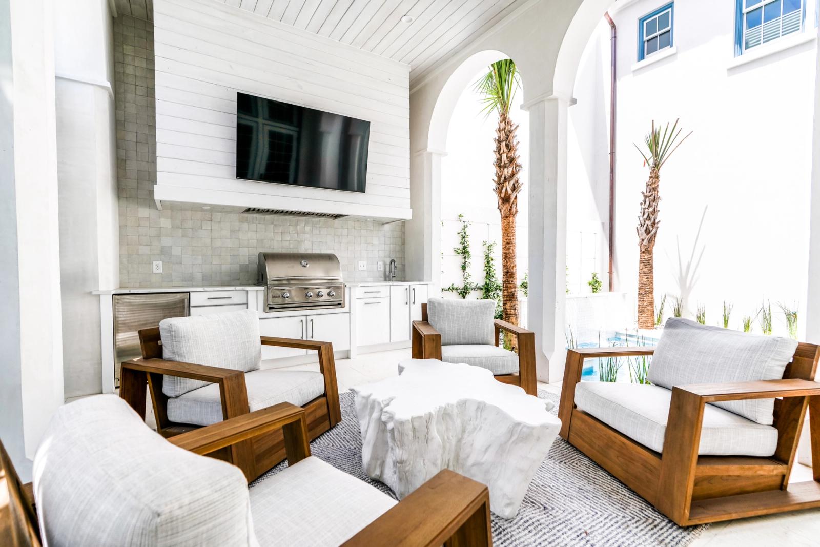 Covered white loggia with crisp white resin cabinetry
