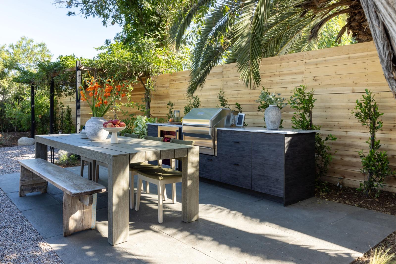 california garden kitchen in charcoal cabinetry with a built-in grill
