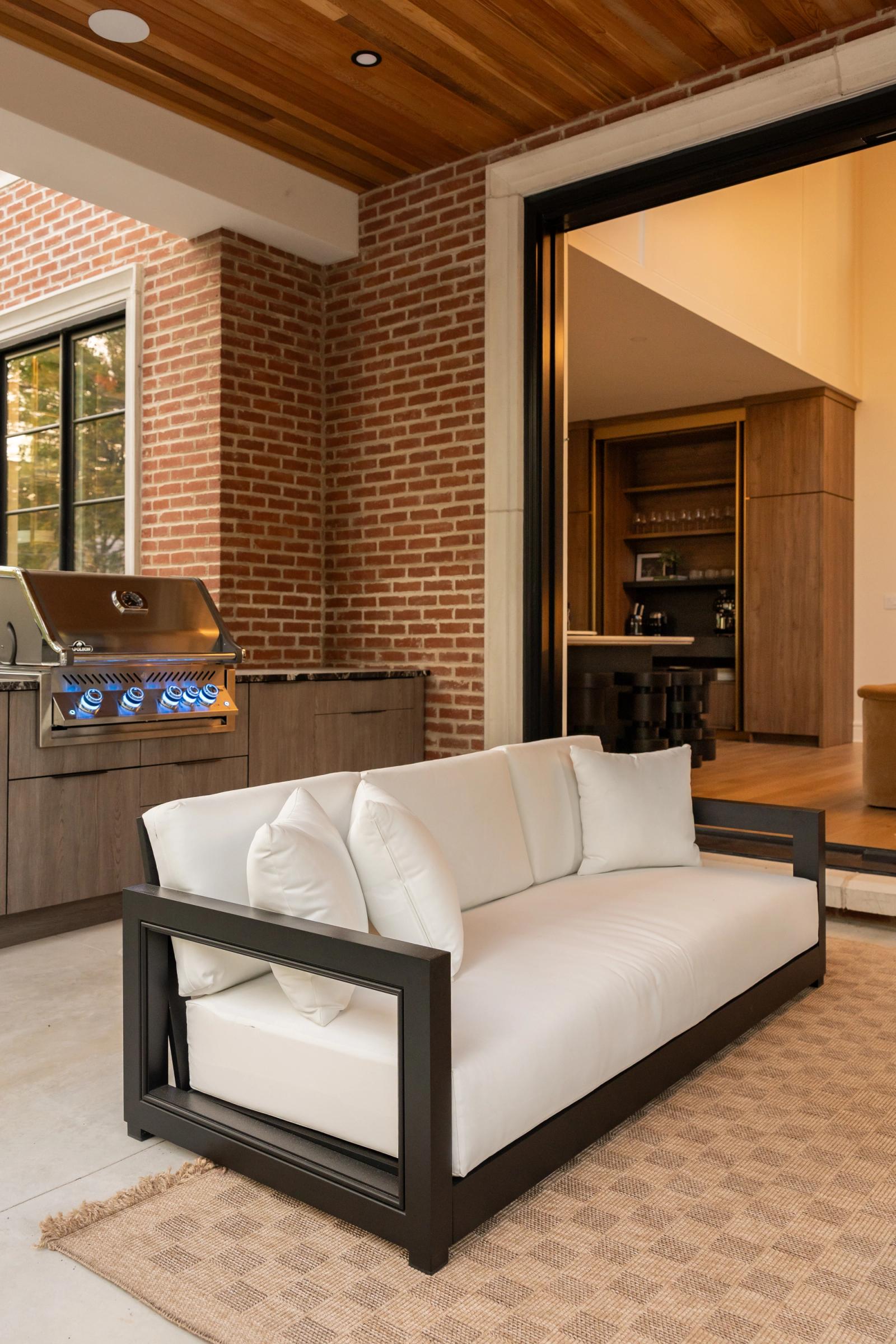 Covered brick patio with outdoor kitchen in oakville ontario