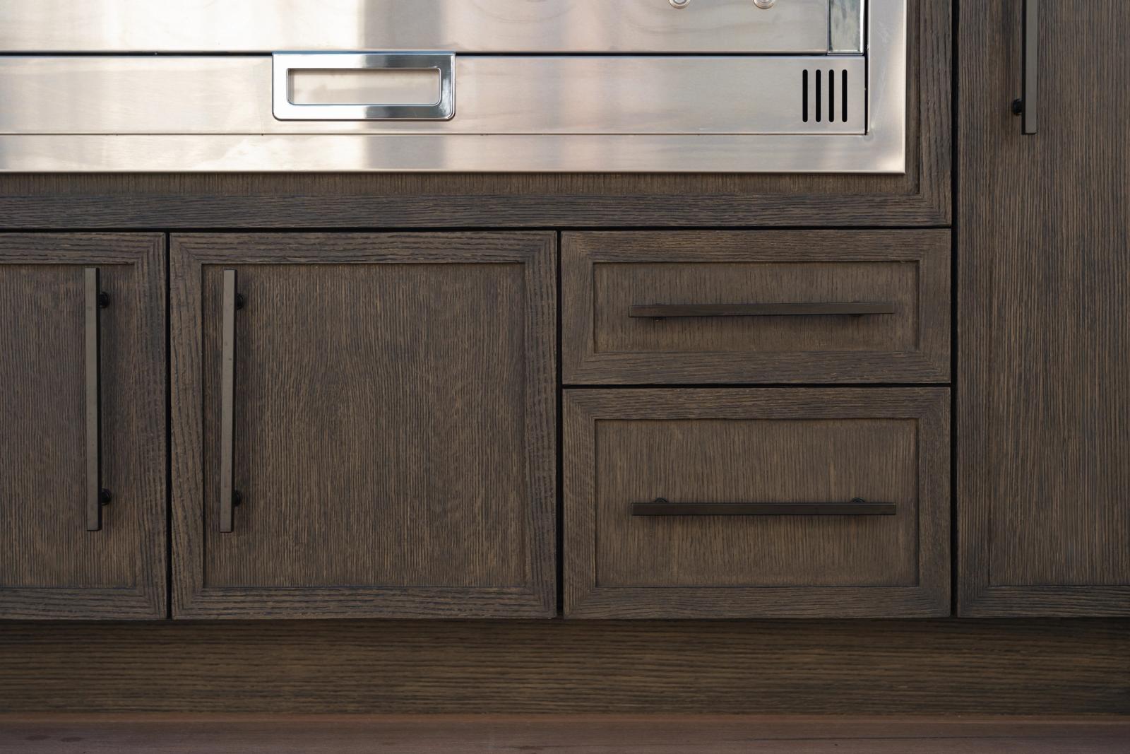 close up outdoor kitchens material wood grain resin slim shaker door