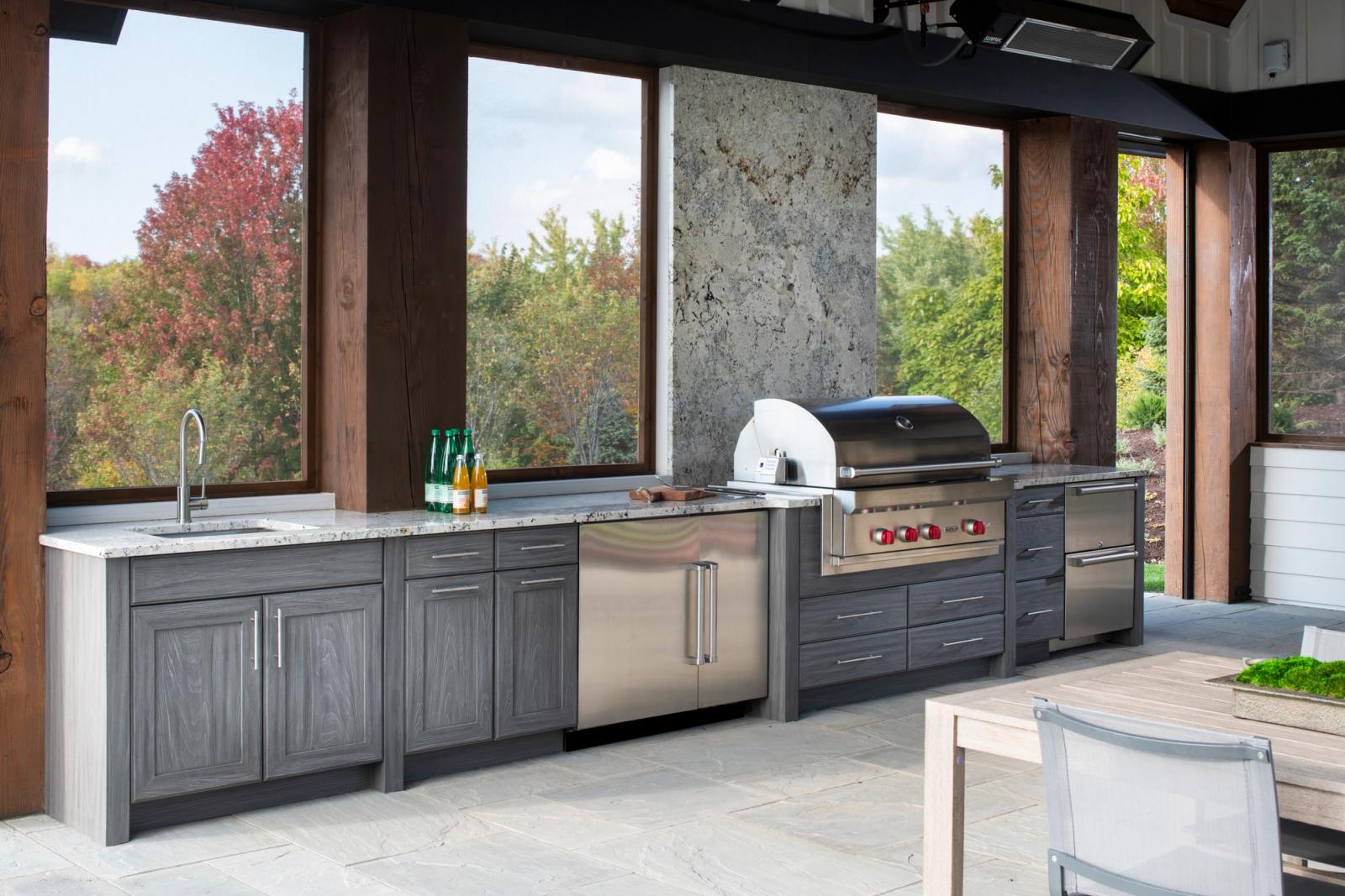 outdoor kitchen run with grill and sink in long lake ontario