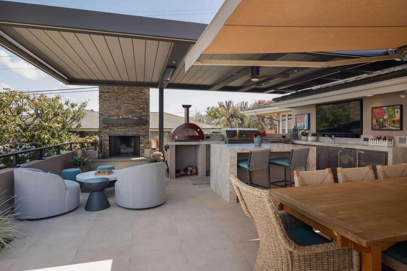 terrace kitchen pergola with fireplace and outdoor kitchen