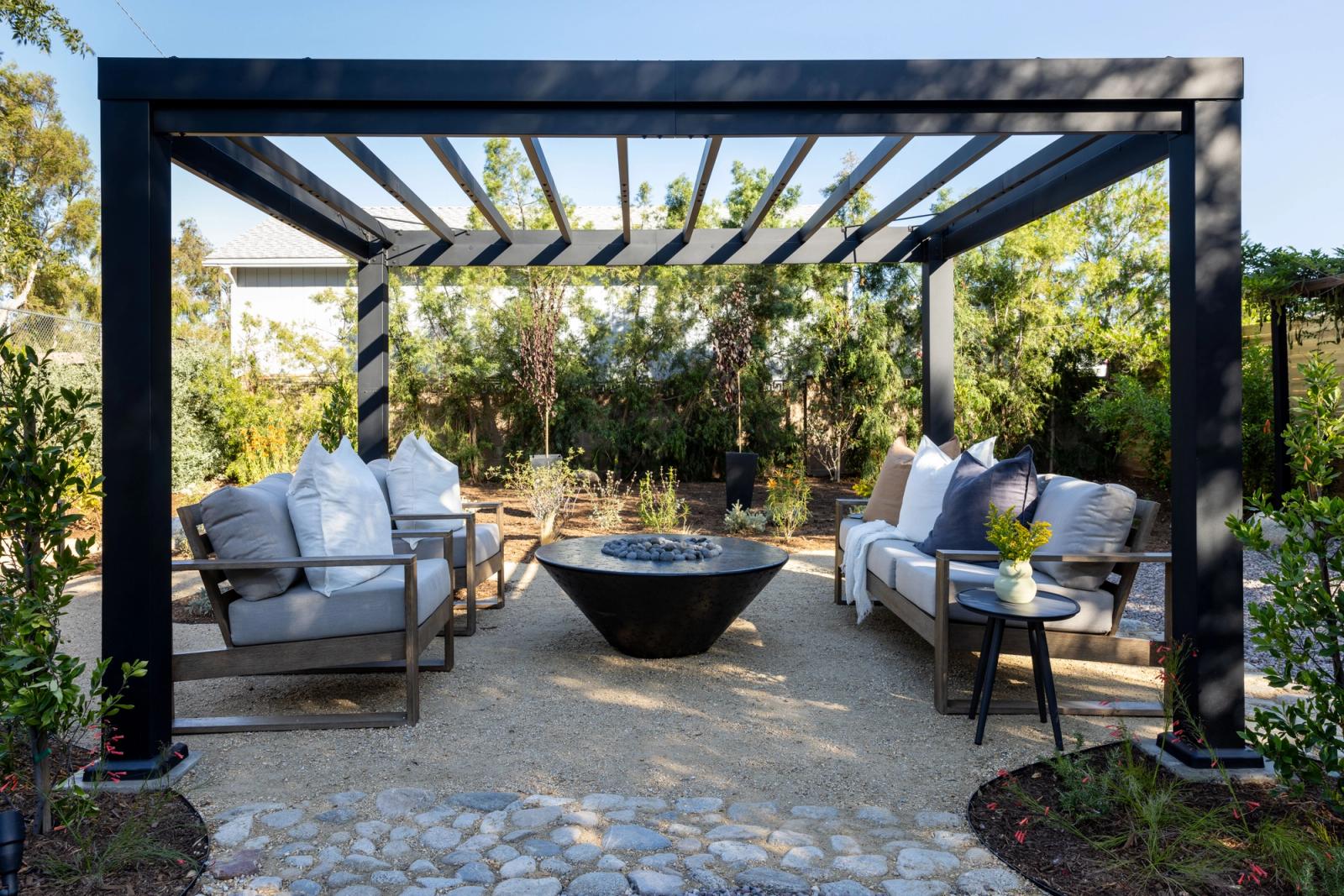 black pergola over outdoor living area in orange county