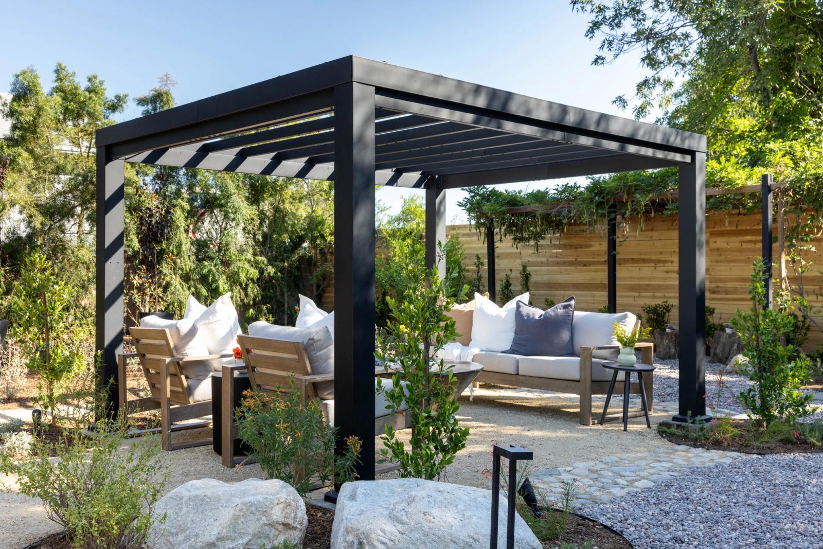 outdoor pergola living area with outdoor kitchen in california