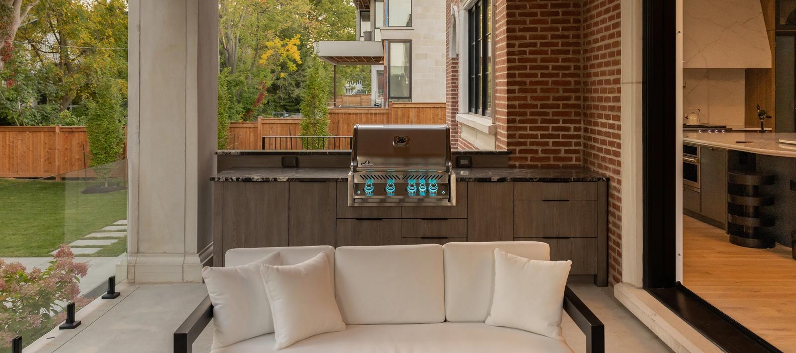 covered porch outdoor kitchen in contemporary slab door with built in grill