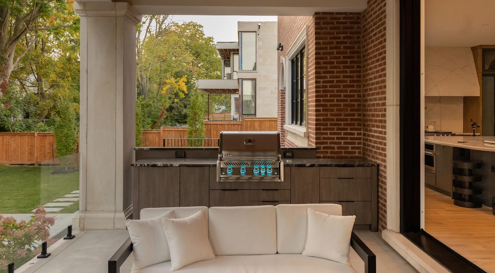 covered porch outdoor kitchen in contemporary slab door with built in grill