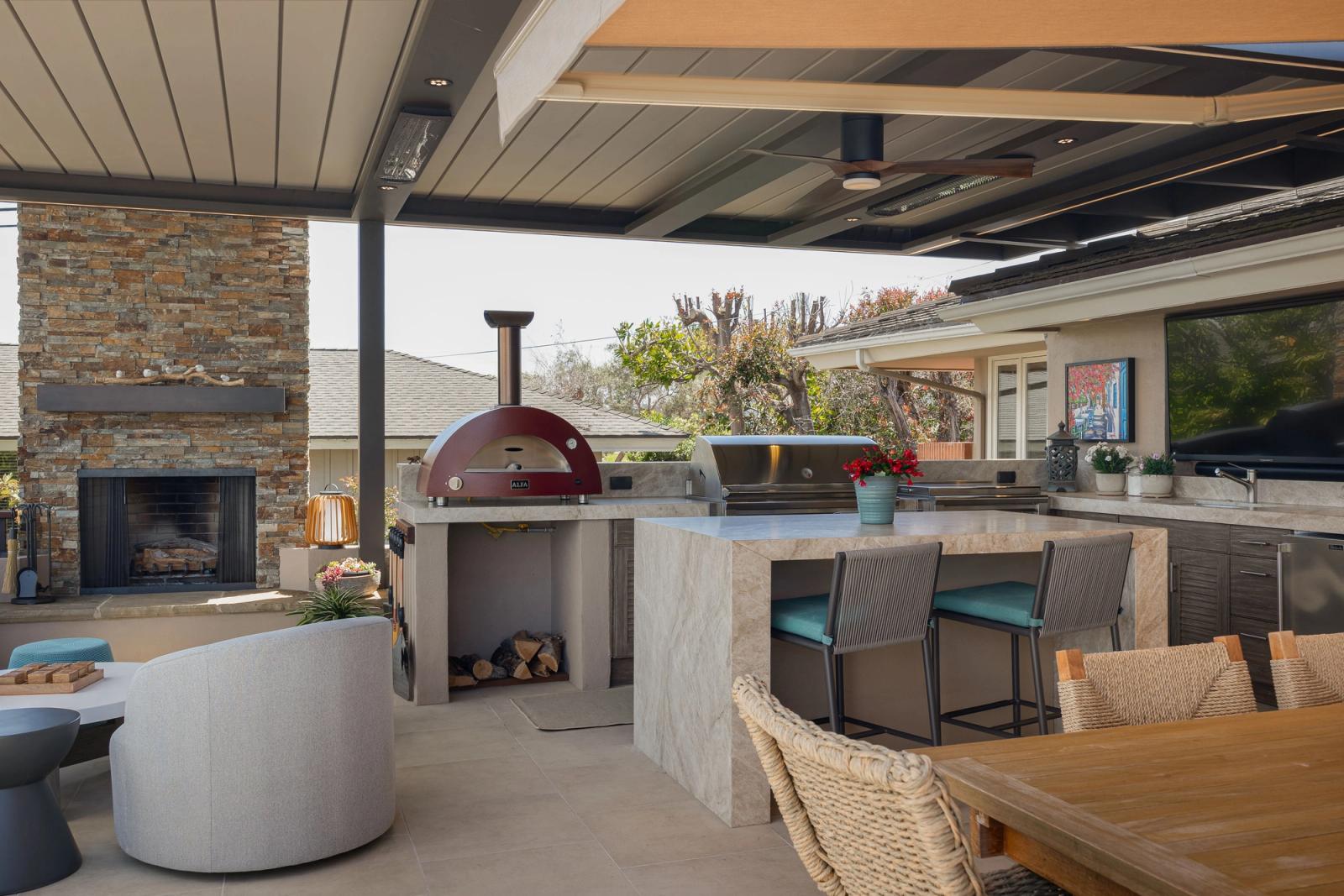 louvered patio cover with outdoor kitchen red pizza oven san diego