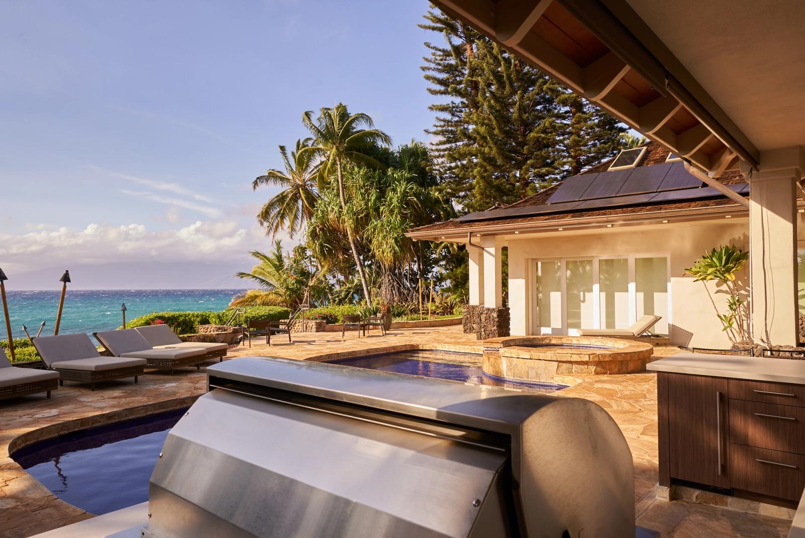 oceanfront terrace kitchen with stainless grill in hawaii