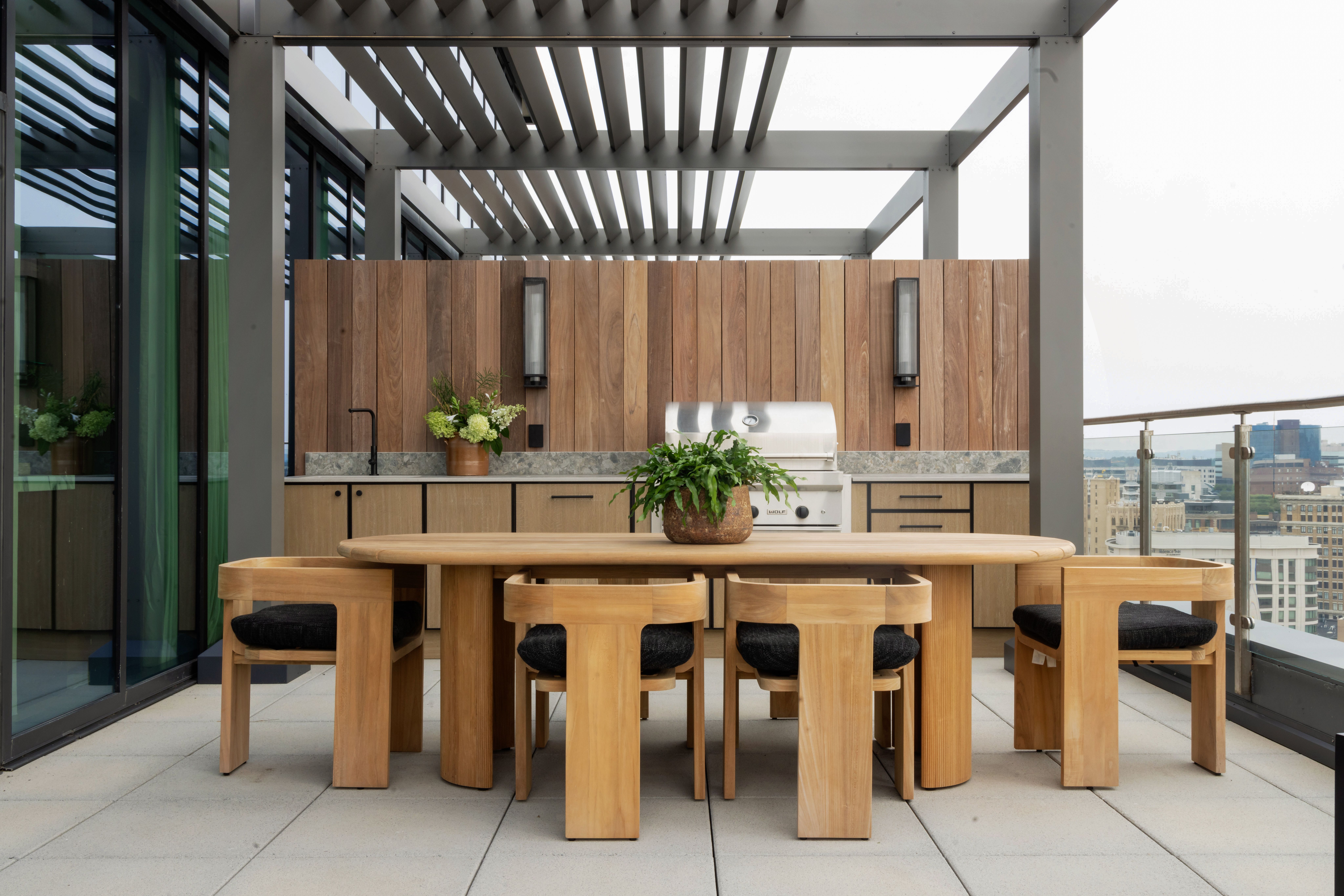 large condo balcony with oak outdoor kitchen
