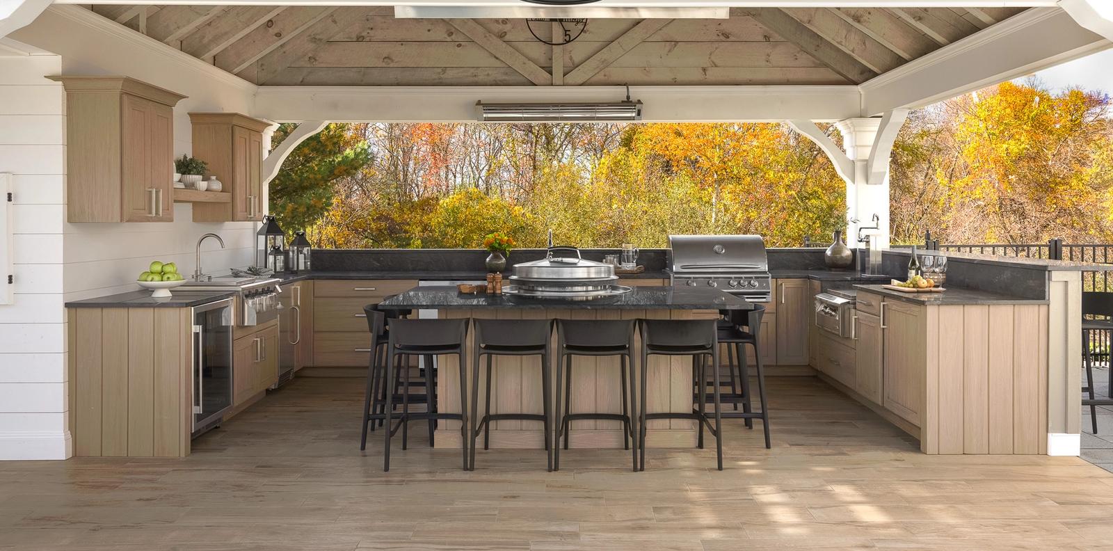 modern farmhouse pavilion with resin outdoor cabinets and island seating