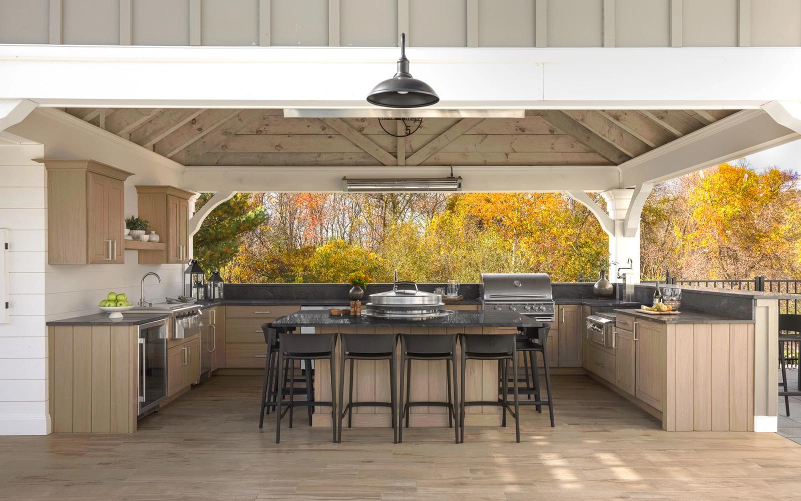 modern farmhouse pavilion with resin outdoor cabinets and island seating