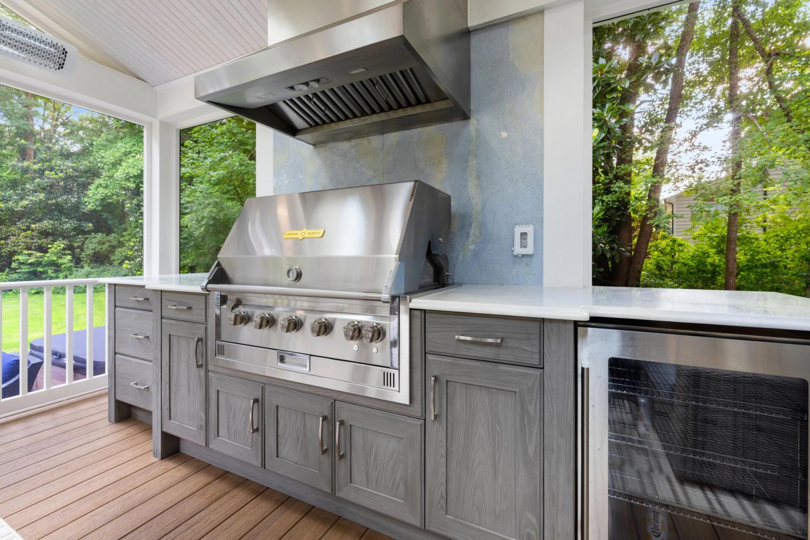 screened porch grey shaker outdoor kitchen with grill and hood