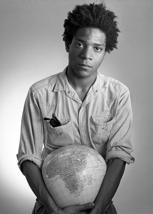 Jean-Michel Basquiat with a globe