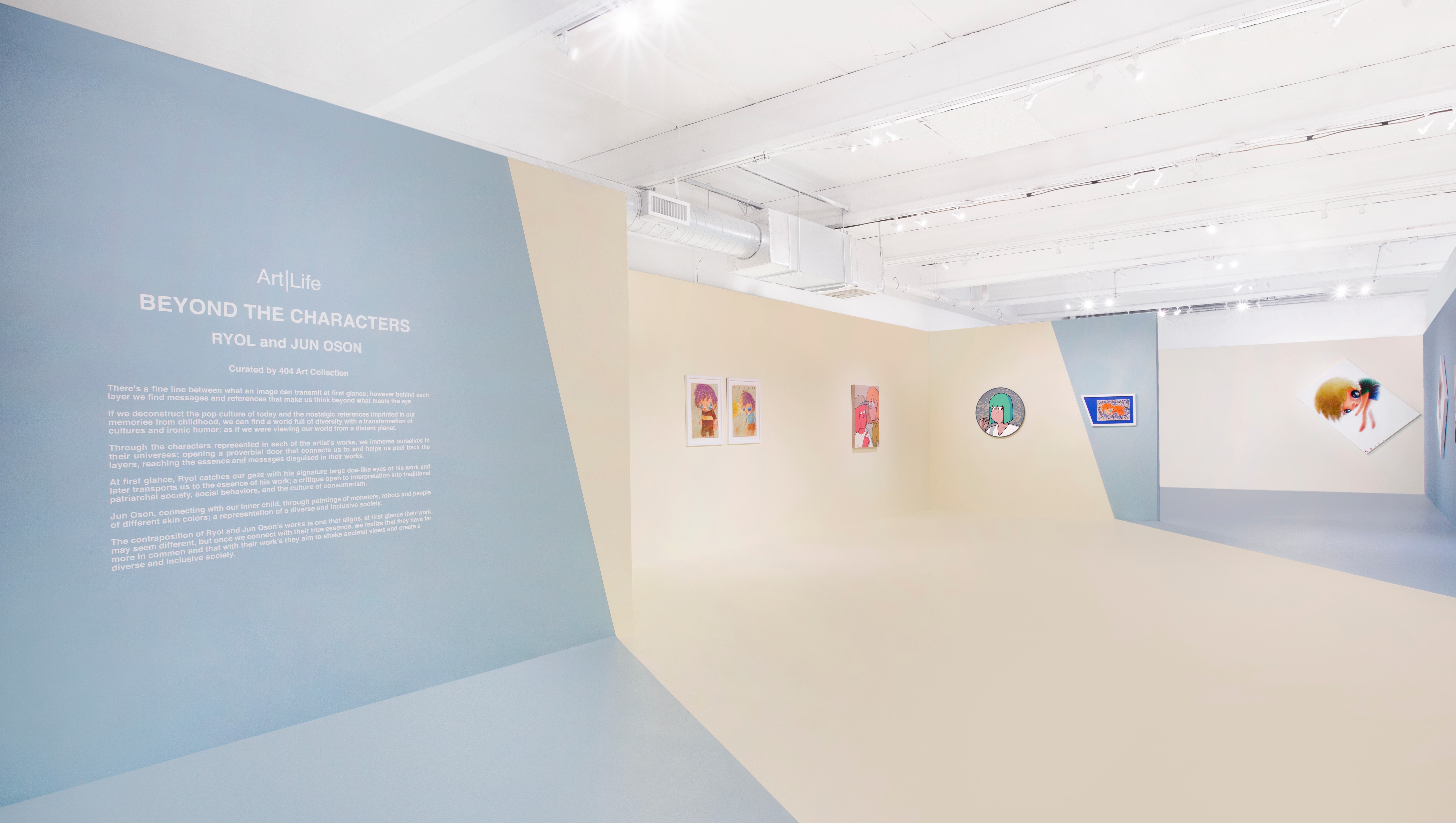 Photo of gallery interior with multicolored walls and artwork on the walls