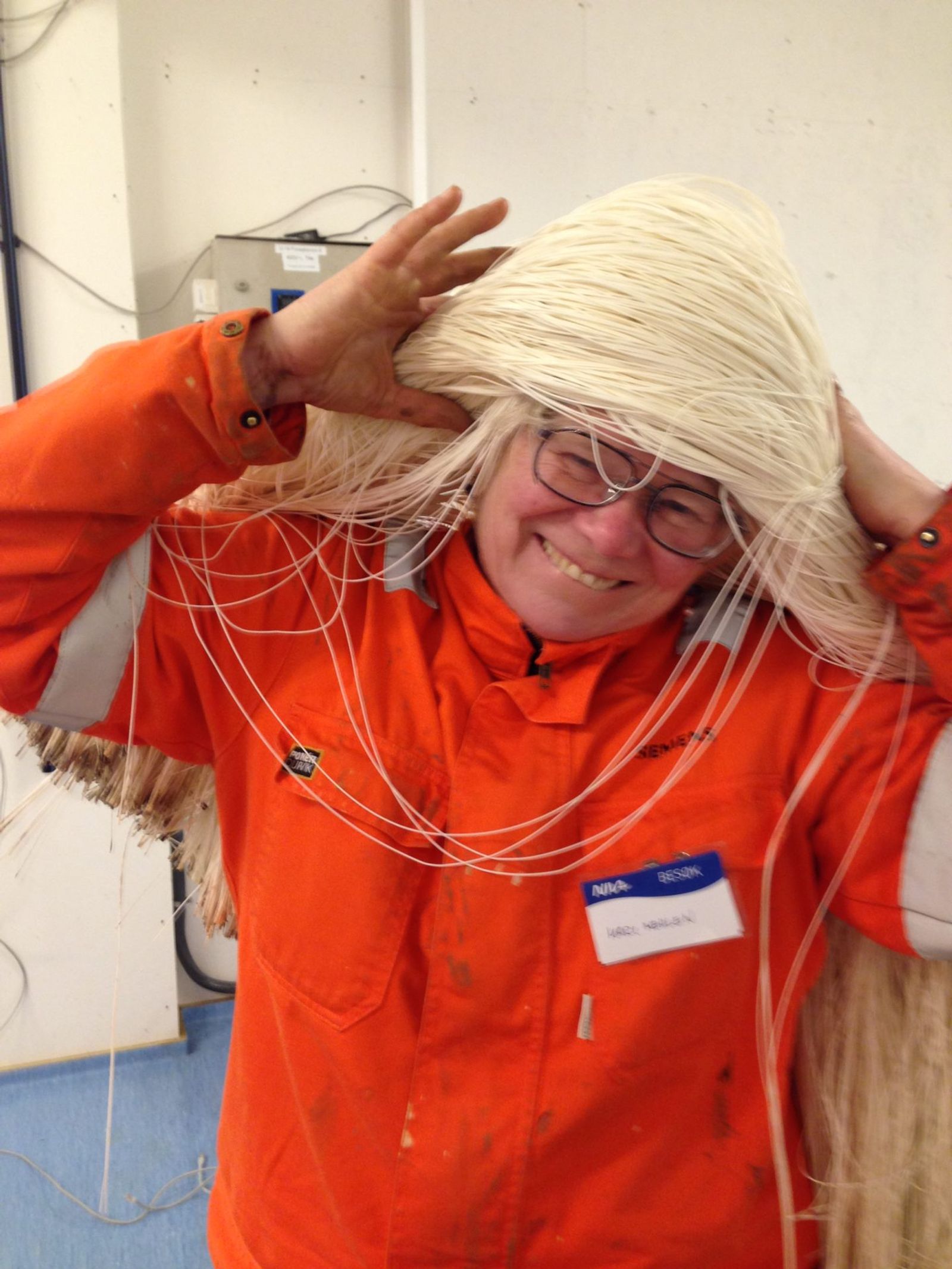 Mari playful with ultrafiltration straws as hair