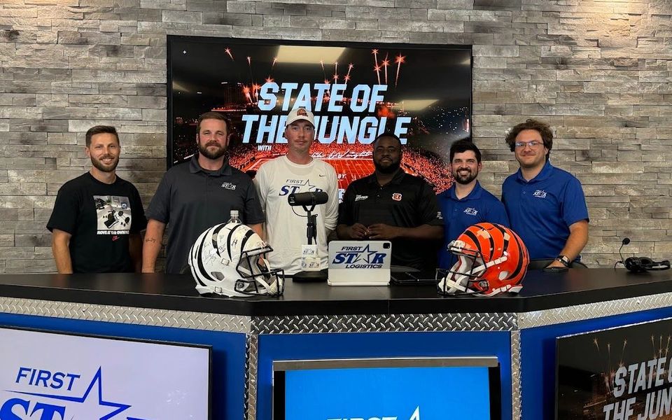 Bengals media personalities gathered on a studio set