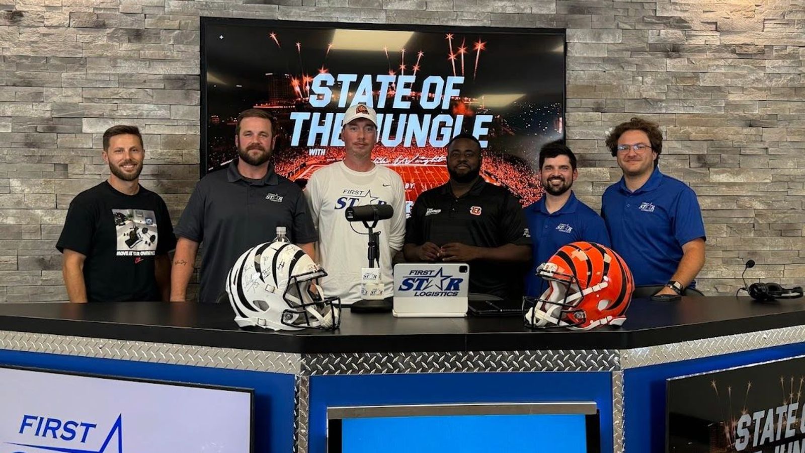 Bengals media personalities gathered on a studio set